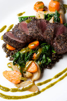 Seared Lamb over greens with autumn vegetables