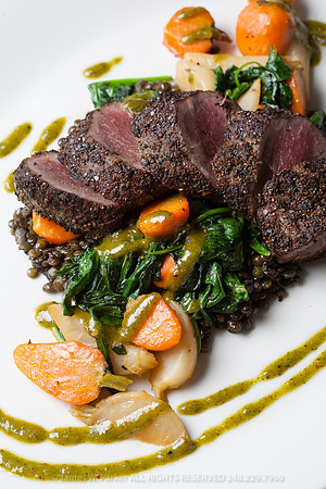 Seared Lamb over greens with autumn vegetables